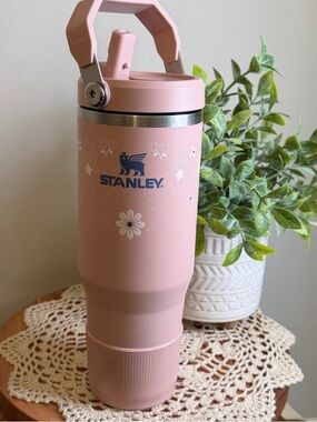 Authentic Stanley Pink Floral Travel Tumbler with Handle and matching boot.